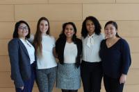 Five students together smiling.
